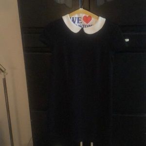 Baby doll style dress with back cutout.